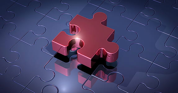 red puzzle on gray surface thumbnail