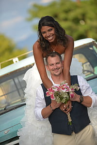 man holding bouquet of flowers near woman thumbnail