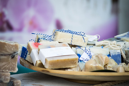 soap bars on brown wooden plate thumbnail