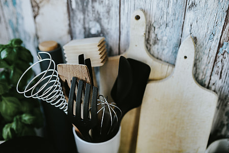 Kitchen utensils and cans by the wall thumbnail