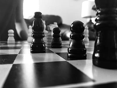 Grayscale Photography Of Chess Board thumbnail