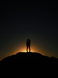 silhouette of couple in the mountain thumbnail