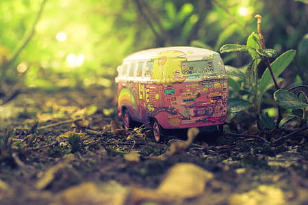 red and white Volkswagen Samba die-cast thumbnail