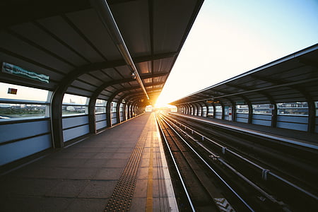 empty railway during during sunrise thumbnail