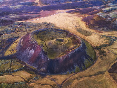 aerial photo of green and brown hill at daytime thumbnail