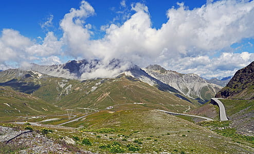 white clouds over mountains thumbnail