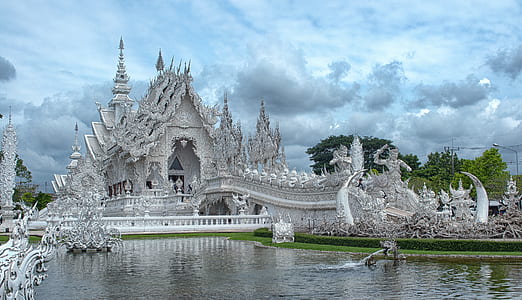 gray castle beside body of water thumbnail