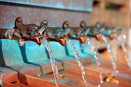 blue and brown metal water fountain pipes thumbnail