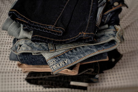 assorted pairs of denim pants thumbnail