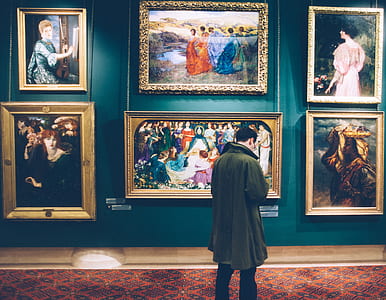 man looking on painting museum thumbnail