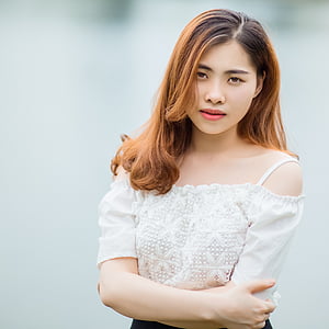 woman holding both shoulders thumbnail
