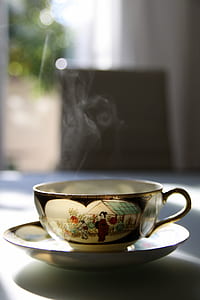 white and brown tea cup thumbnail