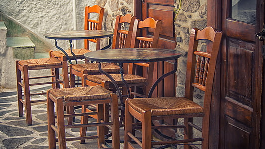 two round wooden tables with chairs thumbnail