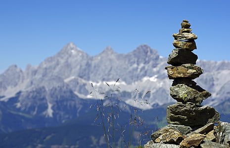 selective focus photography of balanced stones thumbnail