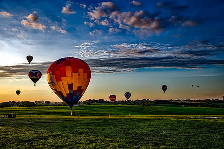 hot air balloon lot during sunset thumbnail