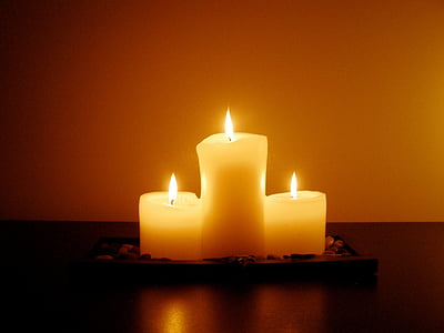 three white candles thumbnail