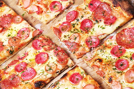 close-up photo of baked pizza thumbnail