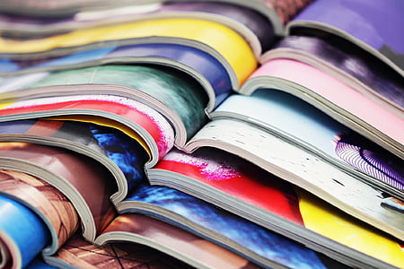 shallow focus photography of multicolored books thumbnail