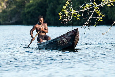 man paddling on boat thumbnail