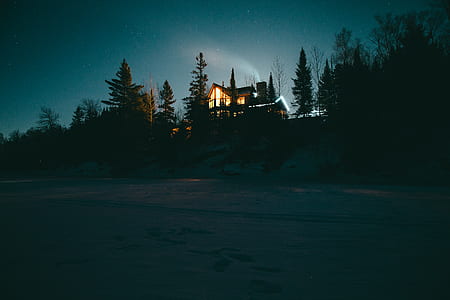 lighted house during nighttime thumbnail