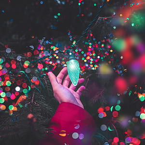person's hand and blue light thumbnail