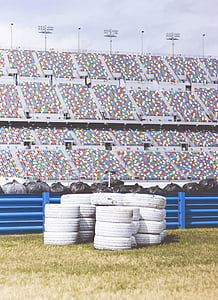 white car tires on green grass thumbnail
