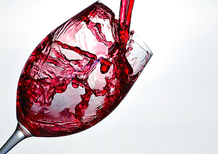 clear wine glass with red liquid thumbnail