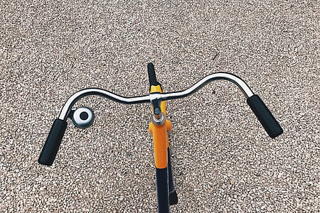 orange and black cruiser bicycle thumbnail
