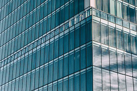 Wide angle shot of glass covered architecture in Manhattan, New York City thumbnail