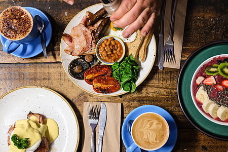 flat lay photography of cooked food with coffees thumbnail