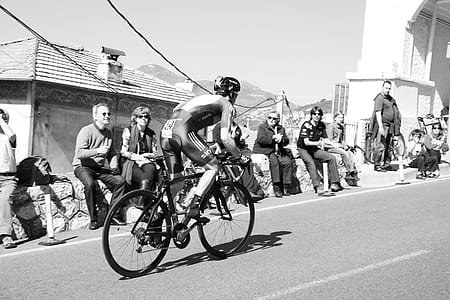 man riding on road bicycle thumbnail
