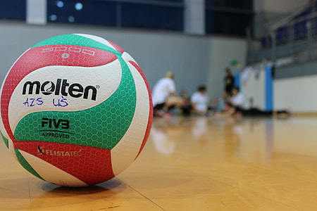 white, green, and red Molten volleyball thumbnail
