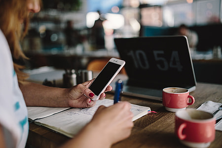 Young woman working in a cafe thumbnail