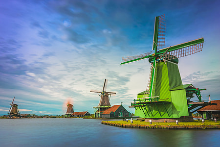 Windmills on a river in Holland thumbnail