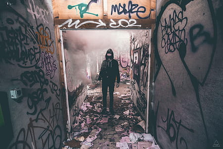 person standing between walls thumbnail