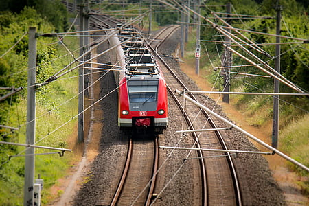 bird eye photography of red and white train thumbnail
