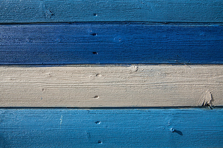 Close-up shot of blue and cream coloured wood panels, image captured in Kent, England thumbnail