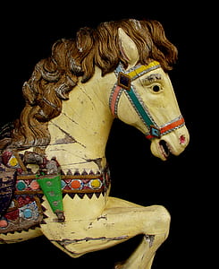 brown horse statue in dark surface thumbnail