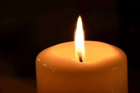 photography of orange pillar candle thumbnail