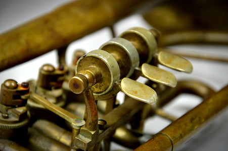 selective focus photography of grey and brass-colored tool thumbnail