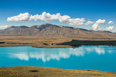 aerial photo of body of water during daytime thumbnail
