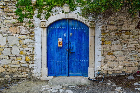 closed blue wooden French door at daytime thumbnail