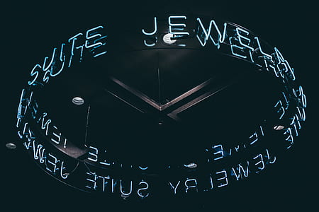 white and black LED signage hanging on the ceiling thumbnail