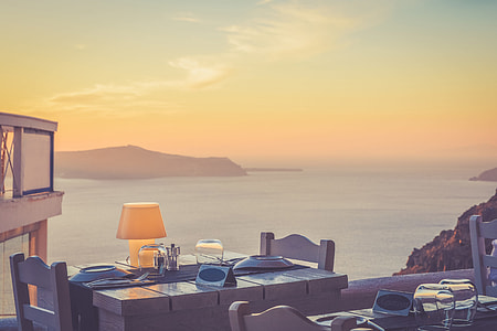 Beautiful dinner setting at a restaurant on the coast of Greece thumbnail
