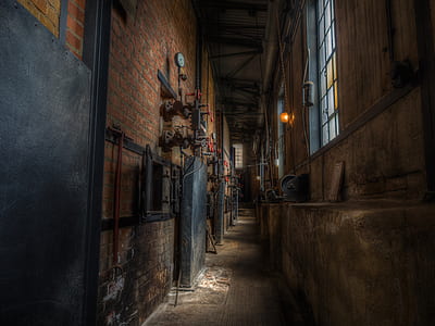 view of concrete pathway in side a building thumbnail