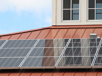 black and white solar panel on orange galvanized iron sheet thumbnail