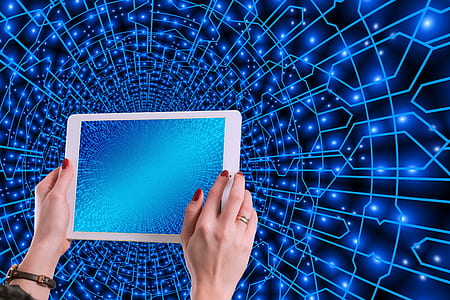 person holding white tablet computer thumbnail