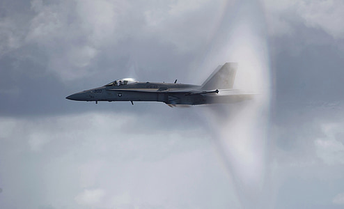 black F1 fighter jet flying during daytime thumbnail