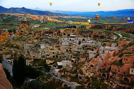 hot-air balloons over city ruins thumbnail
