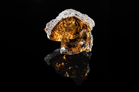 amber stone with black background thumbnail